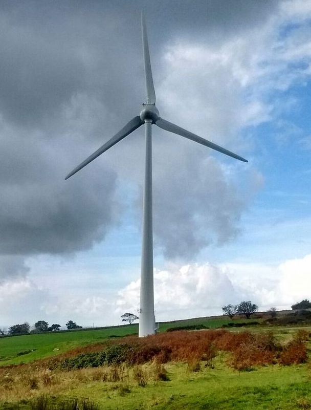 The Salem wind turbine against a cloudy sky