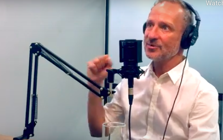 David Baker recording the podcast in the studio